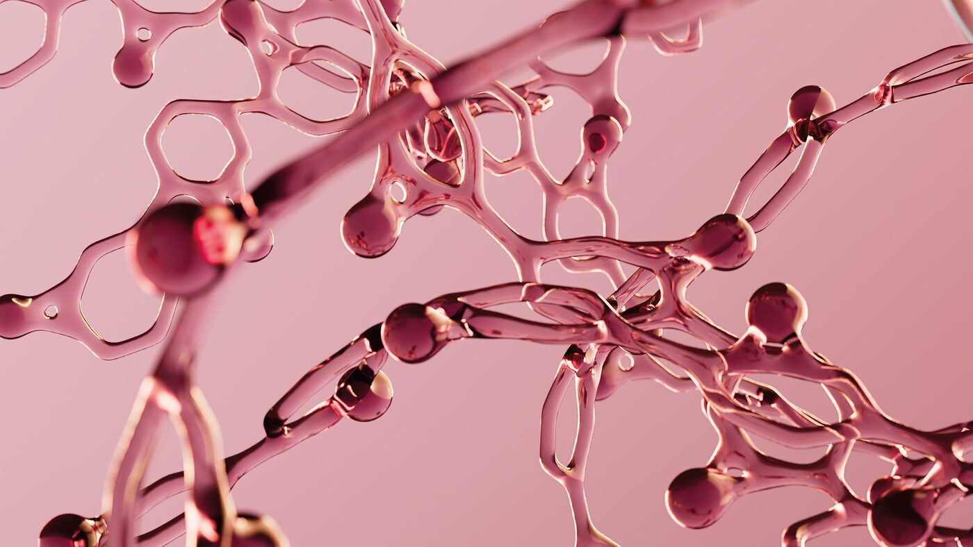 Close-up of linked molecules in soft pink